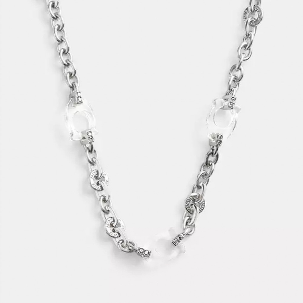 Signature lucite link coach necklace